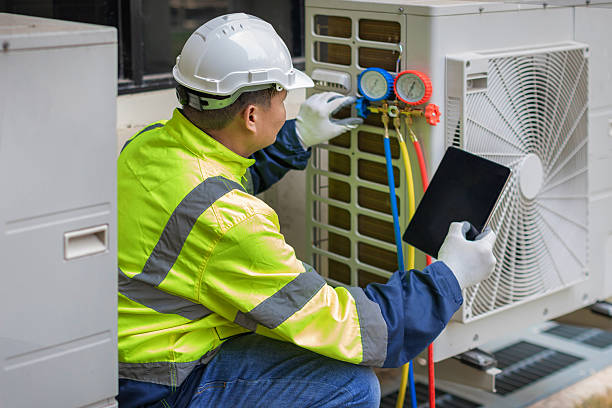 Professional Heat Pump Repair technician working in Oxford, MI
